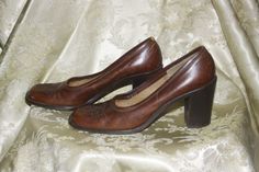 "Vintage brown stacked wooden heels, sz 6 N, made in Italy. Shoes have tooled design on the top and are in great condition, measurements are Heel to toe 9.5\" Width 3\" heel height 3\"" 1970s Shoes Women 70s Fashion, Womens Shoes From The 90s, Vintage Prom Shoes, Vintage Heels With Stacked Heel, Vintage Brown Heels With Wooden Heel, Vintage Heels With Stacked Heel And Almond Toe, Vintage Almond Toe Heels With Stacked Heel, Vintage Brown High Heel Shoes, Vintage Brown High Heel Heels