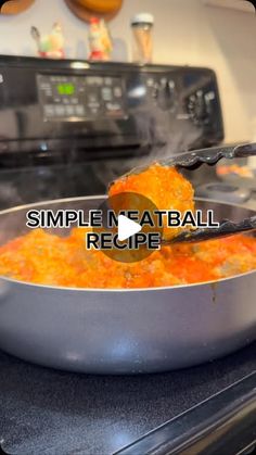 a pan filled with food sitting on top of a stove