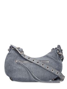 Find BALENCIAGA Small Le Cagole Denim Bag on Editorialist. Height: 16cm Width: 33cm Depth: 8.4cm. Strap drop: 52.5cm. Detachable adjustable strap. Top zip closure. Metal studded details. Includes detachable mirror and zip pouch. One front zip pocket. One internal zip pocket Small Sling Bag, Sling Bag Black, Balenciaga Women, Denim Shoulder Bags, Balenciaga Logo, Denim Bag, Strap Top, Zip Pouch, Small Shoulder Bag