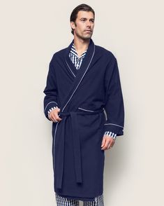 Our flannel has unmatched softness and perfect for year-round comfort. This elegant robe is the perfect addition to our collection. The classic, navy palette is a staple and will have you looking smart in no time. Premium 100% cotton twill makes this design crisp, comforting, and cozy. The moisture-wicking weave is yarn-dyed to help prevent fading. Cotton twill becomes more buttery with every wash. You will be tucked in luxury and off to dreamland. Bonne nuit. Classic Long Sleeve Robe For Loungewear, Classic Long Sleeve Robe For Daywear, Navy Palette, Flannel Robe, Velvet Slippers, Navy Gingham, Black Slippers, Crossword Puzzles, Gingham Pattern