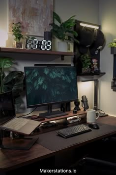 a desk with a computer monitor and keyboard on it