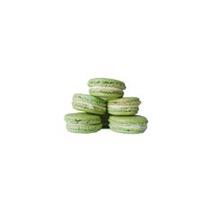 a stack of green macaroons sitting on top of each other