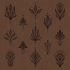 a brown paper with black designs on it