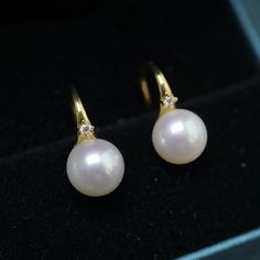 Dainty sterling silver white and pinkish natural freshwater pearl earrings are a delicate and charming accessory that will add a touch of elegance to any outfit. These earrings feature natural freshwater pearls in both white and pinkish tones, carefully selected for their unique and beautiful colors. Pearl Size: 8mm Material: S925 Sterling Silver/Zircon Color: Gold Item Status: In stock Dainty Pearl White Earrings For Pierced Ears, Akoya Pearl Drop Earrings In Pearl White, Delicate Akoya Pearl Earrings In Pearl White, White Akoya Pearl Drop Earrings, Delicate White Gold Pearl Earrings, Delicate Akoya Pearl Earrings With Pearl Charm, Delicate Round Pearl Earrings, Delicate Round Pearl Pendant Earrings, Delicate Round Pearl Earrings With Pendant