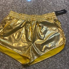 Nwt Gold Shiny Stretch Shorts With Pockets. Sz Xxl But Runs Small And Fits Like Large Or Xl Gold Bottoms With Built-in Shorts For Summer, Gold High-waisted Shorts For Summer, Summer High-waisted Gold Shorts, Spring Beach Gold Bottoms, Gold Stretch Shorts For Night Out, Gold Stretch Short Bottoms, Gold Stretch Summer Shorts, Casual Gold Shorts For Night Out, Gold Shorts For Summer Night Out