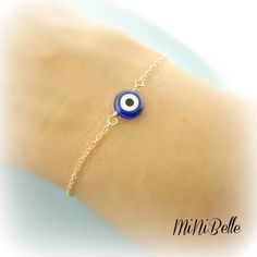 as seen on many this evil eye bracelet I've heard is supposed to bring good luck.... details: 14K Gold Filled Materials glass evil eye measures 8mm please select your desired length from top right drop down menu Blue Evil Eye Bracelets, Blue Evil Eye Bracelet Gift, Blue Evil Eye Round Bracelets, Blue Round Evil Eye Bracelets, Handmade Blue Evil Eye Bracelet, Blue Hypoallergenic Evil Eye Bracelet As Gift, Hypoallergenic Blue Evil Eye Bracelet Gift, Blue Adjustable Dainty Evil Eye Bracelet, Minimalist Round Evil Eye Bracelet