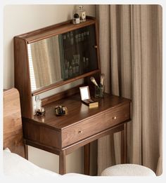 a wooden desk with a mirror on top of it