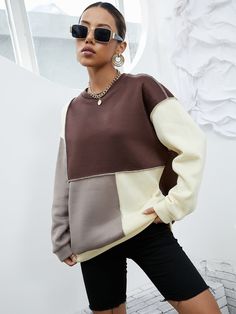 Fit: Regular
Fabric composition: 92% Polyester & 8% Spandex
Style: Casual
Sleeve length: Long
Neckline: Crew
Body closure: None
Type of wash: Machine wash cold Cotton Sweater With Splicing For Fall, Trendy White Patchwork Sweatshirt, Brown Patchwork Sweatshirt For Fall, Fall Brown Patchwork Sweatshirt, Crew Neck Sweatshirt With Contrast Panels For Fall, White Oversized Patchwork Sweatshirt, Fall Crew Neck Sweatshirt With Contrast Panels, Crew Neck Sweatshirt With Contrast Color For Layering, Cotton Long Sleeve Spliced Sweater