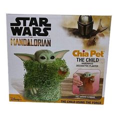 a box with an image of the child yoda from star wars and it's packaging