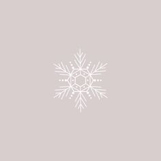 a white snowflake on a gray background