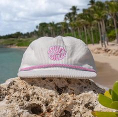 The White and Light Pink Corduroy SunDaze Circle 5-panel hat beautifully captures the essence of the 80's surf era, effortlessly merging classic design elements with a contemporary twist. Crafted from premium white and gentle light pink corduroy fabric, this cap presents a distinct circular emblem adorning its front panel, paying a heartfelt homage to the iconic sun-soaked days of 1980s surf culture. The delicate hues of white and light pink corduroy conjure images reminiscent of the enchanting sunsets over the California coast. This color scheme not only evokes the ethereal beauty of those picturesque sunsets but also reverently nods to the nostalgia-infused vibes that define the era it draws inspiration from. With a 5-panel construction, the cap ensures a comfortable and secure fit, acco Surf Hats, Corduroy Hat, Flat Hats, Vintage Sunset, Pink Corduroy, 5 Panel Hat, Surf Culture, Panel Hat, California Coast