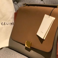 This Is An Authentic Celine Suede Calfskin Medium Tri-Color Trapeze. This Stylish Multicolor Tote Is Crafted Of Suede Calfskin Leather. It Features Black Rolled Leather Top Handle With Optional Shoulder Strap, Polished Gold Hardware, And White Leather Trapeze Sides With Snap Closures. The Flap Opens To A Burnt Orange Microfiber Interior With Patch Pockets. This Bag Has Been Worn A Few Times And Is Well Cared For. This Is A Gorgeous Everyday Bag, With The Sophistication And Style Of Celine! Celine Trapeze, Trapeze Bag, Celine Bags, Everyday Bag, Orange Gold, Leather Top, Kate Spade Crossbody, Tri Color, Burnt Orange