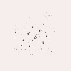 black and white photograph of stars in the sky on a light pink background with space for text