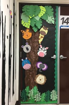 a door decorated with jungle animals and trees