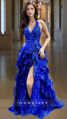 Elevate your formal look with our Blue Tiered Prom Dress from HONGIVEY. This A-Line design boasts sparkling floral accents and elegant straps. The tiered skirt adds dimension and charm to this formal ball gown. Make a statement at your next event and turn heads in this stunning dress.