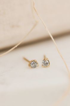 A magical salt and pepper diamond is carefully set in lightly textured solid gold with dainty claws. The perfect bit of edge to add to your look! Available as a single or a pair for all your second piercing needs Details: -Your choice of 10k yellow or white gold, or 14k yellow, rose or white gold-Finish: polished (can be matte satin upon request) -Sparkling, 2mm responsibly sourced salt and pepper diamond (expect variances from images as each diamond is completely one of a kind)-Available as a s Sculpted Jewelry, Second Piercing, Long Beach California, Pepper Diamond, Matte Satin, Salt And Pepper Diamond, Single Earring, Material Girls, Yellow Rose