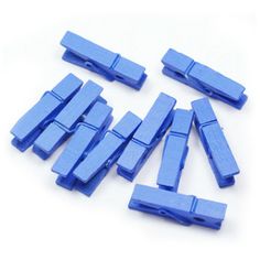 blue plastic clips on white background