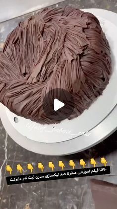 a cake with chocolate frosting on top of it