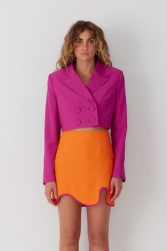 The Barbados Crop Blazer is the pop of colour you need. A structured blazer, with sleek design lines, perfectly cropped to meet the top of highwaisted skirts and pants. Wear full fastened, as a top, and pair back with the matching skirt for an elevated colour blocked set. Quirky Maximalist, Highwaisted Skirts, Maximalist Fashion, Wolf Gang, Pop Aesthetic, Structured Blazer, Blazer And Skirt Set, Color Block Skirt, Color Blocking Outfits