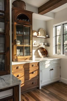 the kitchen is clean and ready to be used for cooking or baking, with dishes on the shelves