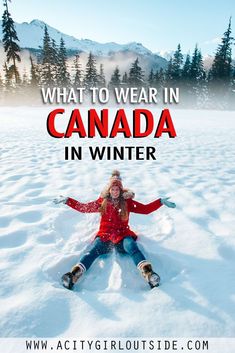 a woman sitting in the snow with her arms out and text overlay that reads what to wear in canada in winter