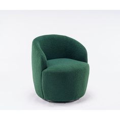 a green chair sitting on top of a white floor