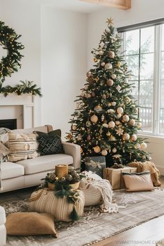 a living room filled with furniture and a christmas tree