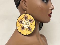 "Beautiful fabric earrings. Earrings shown are 4 inches! Earrings are light weight. Earrings may differ from photo shown due to the cut of the fabric and/or the size.  Earrings are made when ordered. Please observe the size display pictured. They are not returnable. Earrings shown are 4\"!" Hand Painted Gold Earrings For Festival, Yellow Round Earrings For Festivals, Gold Hand Painted Earrings For Festivals, Earrings Fabric, Earrings Aesthetic, Fabric Earrings, Flower Fabric, Jewelry Statement, Wood Jewelry