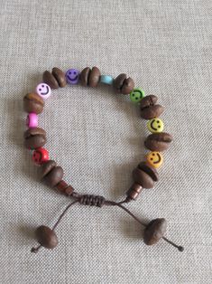 a beaded bracelet with smiley faces on it