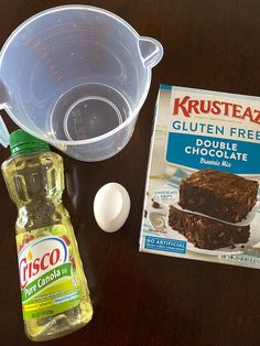 ingredients to make chocolate cake sitting on a table