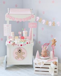 a pink and white baby's first birthday party