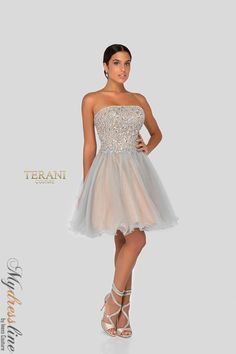 Looking for a show-stopping dress for prom? Check out the Terani Couture 1911P8016. This gorgeous dress is perfect for making a statement on your big night. With intricate beading and a figure-flattering silhouette, you'll look like a true queen in this gown. Trust us, all eyes will be on you when you step out in this stunner. So don't wait – order your Terani Couture 1911P8016 dress today! Tulle Cocktail Dress, White Evening Gowns, Beaded Tulle, Terani Couture, Short Party Dress, Perfect Prom Dress, Short Cocktail Dress, Cheap Wedding, Prom Dresses Short