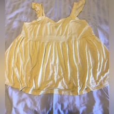 This Is A Nwot Torrid Baby Doll Summer Tank In Pretty Yellow! Cotton Stretch Ruffle Tank Top, Cotton Stretch Tank Top With Ruffles, Stretch Cotton Tank Top With Ruffles, Cute Ruffled Solid Color Tops, Cute Solid Tops With Ruffles, Cute Solid Color Tops With Ruffles, Cute Ruffled Strap Tops For Beach, Cute Ruffled Straps Tops For Beach, Cute Ruffled Strap Beach Tops