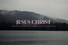 the words jesus christ are in front of a lake with trees and mountains behind it