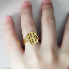 Gold Circle Block Monogram Ring,3 Initials Monogrammed Name Ring,Personalized Wedding Monogram Ring,Custom Name Jewelry Christmas Gift The initials on this sterling silver, handmade ring are made to create a stunning showpiece on your finger You choose the letters and I create your unique monogram. It can be your initials (usually with the family name in the center), or the initials of those most special to you. Please let me know upon checkout in 'notes to seller': Please tell me about the diam Ring Initial, Gold Initial Ring, Unique Monogram, Engraved Engagement Ring, Family Rings, Name Ring, Fingerprint Jewelry, Piercing Shop, Monogram Ring