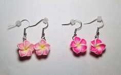 A cute pair of flower earrings made using flower beads. Comes in 2 shades of pink! Each pair comes with 2 earring backs as shown in picture. Adjustable 3d Flower Drop Earrings, Adjustable 3d Flower Earrings, Handmade Pink Flower Earrings, Cute Pink Flower Earrings With Ear Wire, Pink Cute Earrings With Handmade Flowers, Adjustable Handmade Flower Earrings, Pink Adjustable Dangle Flower Earrings, Pink Flower-shaped Earrings For Pierced Ears, Pink Flower Earrings With Ear Wire