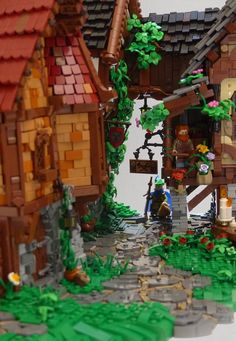 a lego village with lots of trees and houses