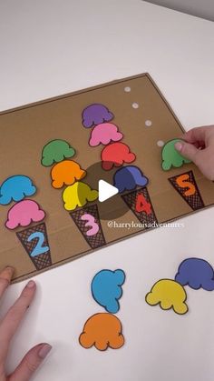 someone is making an ice cream themed number puzzle