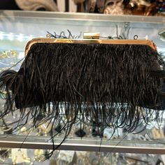 A New Clutch Feather Purse For After Five Events Can Dress Up A Casual Outfit Nicely Black Shoulder Bag With Chain Strap For Events, Black Clutch With Gold-tone Hardware For Evening, Black Leather Evening Bag For Night Out, Black Leather Evening Bag For Events, Chic Black Bag For Events, Black Leather Clutch For Night Out, Chic Black Clutch For Events, Black Leather Clutch For Party, Black Leather Party Clutch