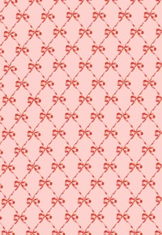 a pink background with red bows on it