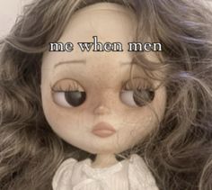 a close up of a doll with the words me when men