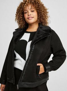 FIT Model is 5'10. 5” wearing size 1. . Measures 30” from shoulder (size 2). . MATERIALS + CARE Faux suede woven fabric. . 100% polyester. Machine wash cold. Line dry. Imported. DETAILS V-neck with collar. Long sleeves. . Faux fur lined. The best plus size women's faux suede fur-lined moto jacket leather & jackets in deep black made of suede. Torrid is your destination for cozy fall and winter clothes to keep you warm and comfortable. Black Moto Jacket, New Street Style, Swimming Outfit, Bra And Panty Sets, Deep Black, Winter Clothes, Faux Fur Jacket, Cozy Fall, Moto Jacket