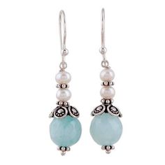 Nestled below sterling silver accents radiant light aqua aventurine stones with a total carat weight of 3.5 add subtle color to these alluring earrings. Above each gemstone two cultured freshwater pearls gleam brightly. Narayani of India designs the beautifully handcrafted earrings. Elegant Amazonite Dangle Jewelry, Elegant Aquamarine Nickel-free Earrings, Amazonite Drop Earrings As Gift, Dangle Earrings With Amazonite And Natural Stones, Elegant Aventurine Gemstone Jewelry, Silver Aquamarine Gemstone Earrings, Elegant Silver Aventurine Jewelry, Silver Aquamarine Dangle Earrings, Elegant Amazonite Earrings As A Gift