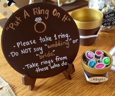 a sign that says, don't ring on h please take 1 ring do not say wedding or take rings from those who do