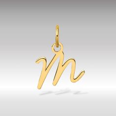 "Style is eternal," they say, and the 14K Gold Script Letter "M" Initial Pendant embodies this sentiment perfectly. With its timeless design and elegant craftsmanship, this pendant exudes sophistication and charm. Crafted from luxurious 14-karat gold, it adds a touch of refinement to any outfit. The graceful script letter design of this pendant brings a personalized touch to your ensemble. Whether you're attending a formal event or enjoying a casual outing, the 14K Gold Script Letter "M" Initial Letter M Pendant, Letter Pendent, M Initial, M Letter, Letter Design, Script Lettering, Personalized Pendant, Letter M, Initial Pendant