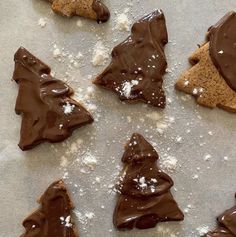 chocolate christmas tree cookies on a baking sheet