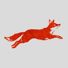 an image of a red fox jumping in the air