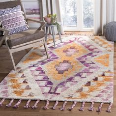 an area rug with various colors and patterns