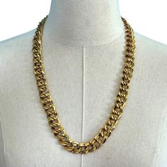 "VINTAGE | Monet Gold Tone Double Cuban Link Chain Necklace | Triple Plated | Hook Closure | 27\" L  - Gorgeous vintage gold tone double Cuban link chain necklace signed Monet  - Heavy, chunky design  - Triple plated, very shiny   - Hook closure  - 27\" length, approximately 1/2\" wide  - Excellent condition, no gold wear noted  - Will arrive packaged in a gift box Please look carefully at the pictures for condition and size, as the pictures are part of the description. I am happy to answer any questions and provide additional photos if necessary. A Note on Vintage Items: Vintage items are at least 20 years old and unless they have been kept in their original packaging and hidden away, they have had 20 or more years of handling, wear and tear. They are often not in perfect condition, rathe Vintage Yellow Gold Chain Link Necklace, Vintage Brass Jewelry With Chunky Chain, Vintage Yellow Gold Curb Chain Necklace, Vintage Gold Necklace With Chain Strap, Classic Gold Metal Chain Necklace, Vintage Yellow Gold Necklace, Vintage Formal Chain Necklace, Vintage Gold Link Chain Necklace, Vintage Gold Metal Chain Necklace