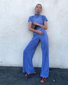 Silky Plisse Pleated Turtleneck Set As seen on Elsa Hosk Satin Crinkle Turtleneck Top Pant Suit Pajama Style Fashion Crinkled Satin Fabric Short Sleeves Elastic Waist Pants 100% Polyester Size guide: S Top - Length 55.5cm Bust 72.5cm Shoulder 28.5cm Sleeve 18.2cm Pants - Waist 62cm Hips 96cm  M Top - Length 56.5cm Bust 76.5cm Shoulder 29.2cm Sleeve 18.7cm Pants - Waist 66cm Hips 100cm  L Top - Length 57.5cm Bust 80.5cm Shoulder 30.2cm Sleeve 19.2cm Pants - Waist 70cm Hips 104cm  Due to the current Shipping Prices and Health Reasons, we cannot return/exchange items. We send a replacement for faulty items. Hot Girl Summer, Y2K Clothing Loungewear Outfit, Mock Neck Shirt, Wide Leg Pant Suit, Traje Casual, Elsa Hosk, Top Pants Set, Pleated Shorts, Pantalon Large, Suit Pants